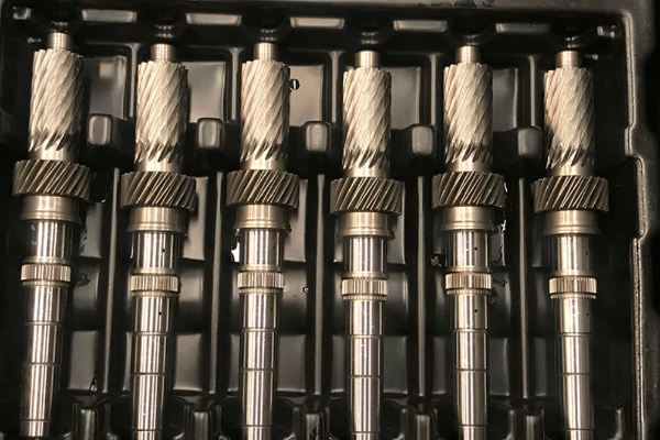 Electric Vehicle Drive Shafts: Heavy-Duty Logistics & Circular Packaging Solutions